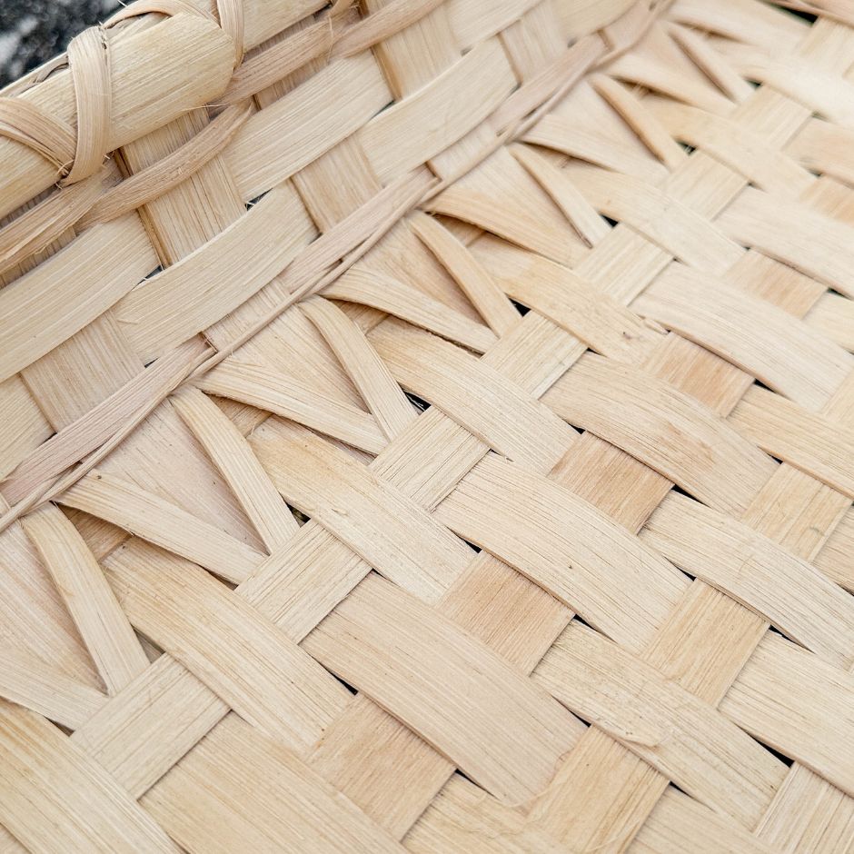 Detail of the inside of a basket showing the chicken feet weaving.