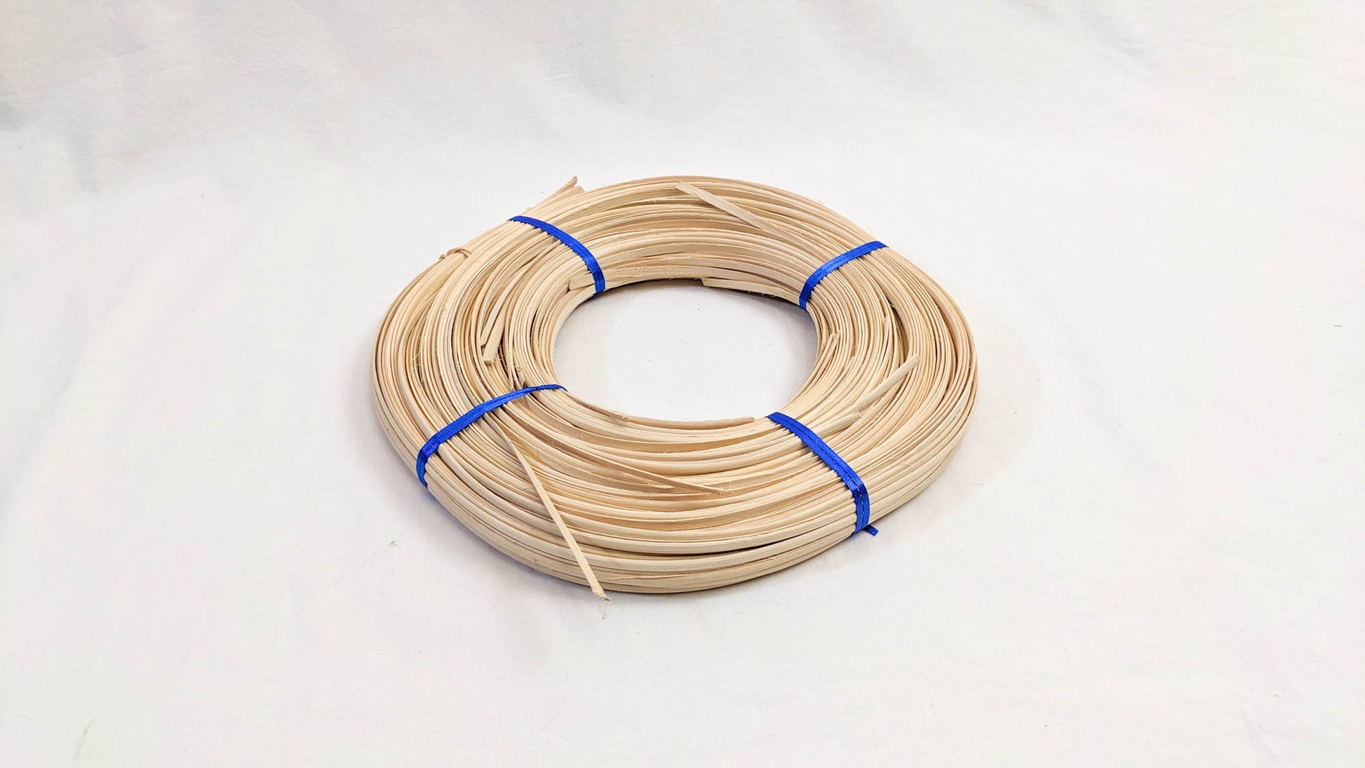 Flat-oval reed 1/4" - 1 Pound Coil - Textile Indie