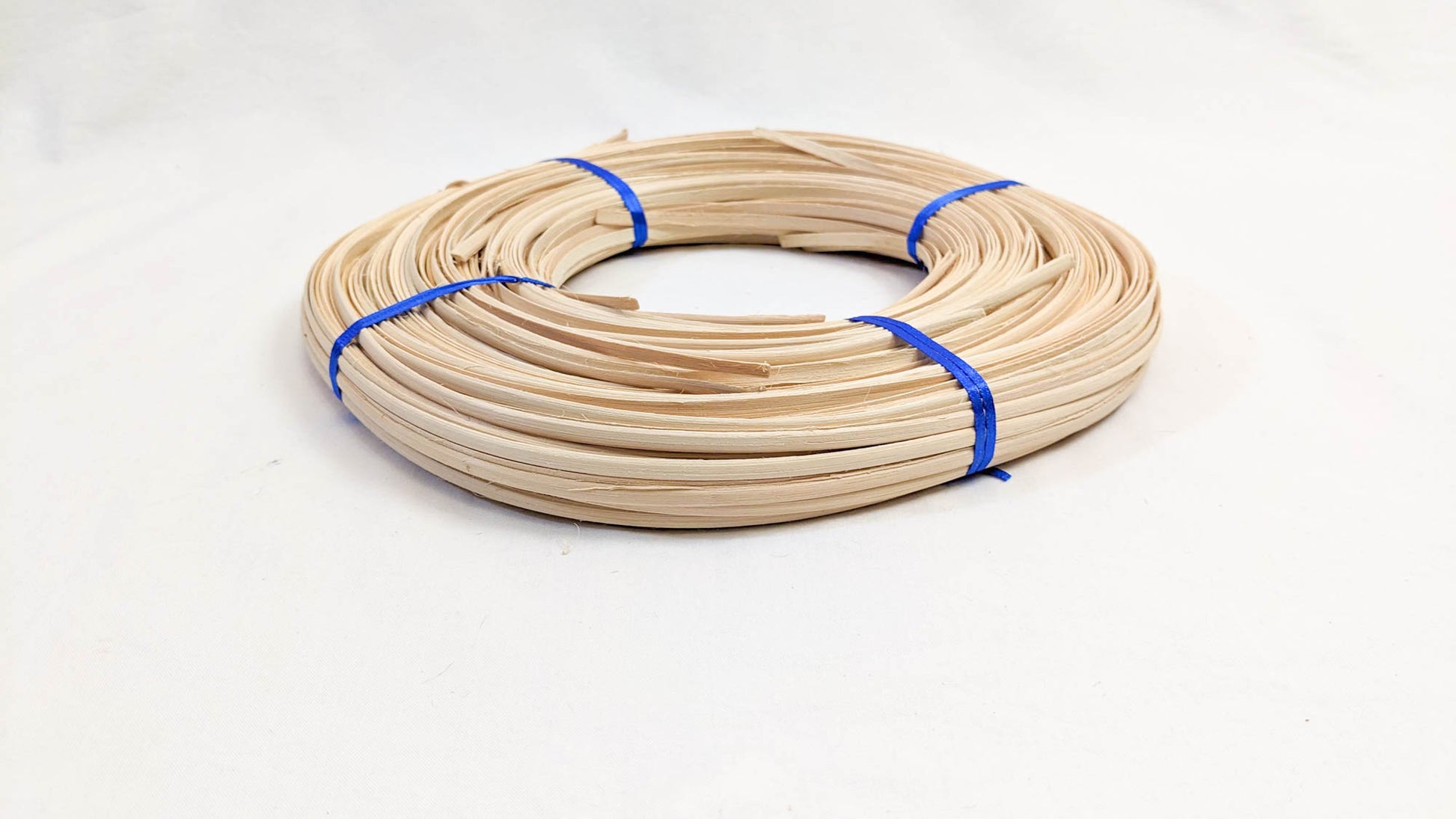 Flat-oval reed 1/4" - 1 Pound Coil - Textile Indie