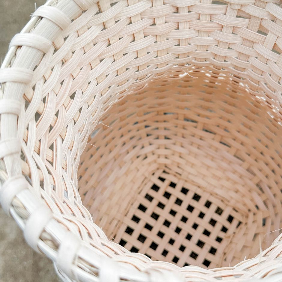 Detail shot of the inside of a stair step vase basket. 