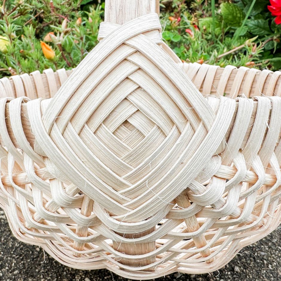 God's eye weaving detail on a melon basket. 