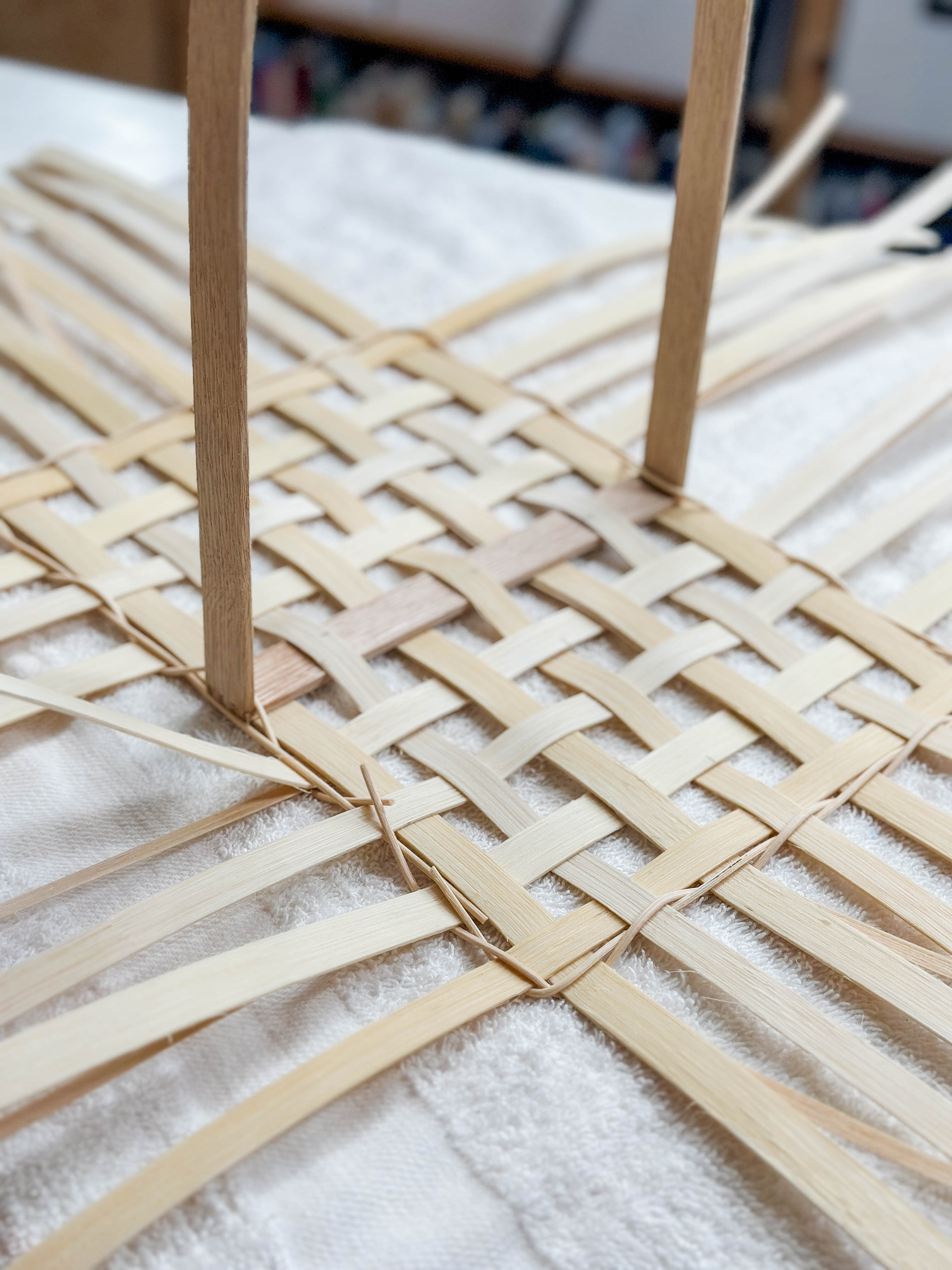 Load video: Watch the process of weaving the market basket.