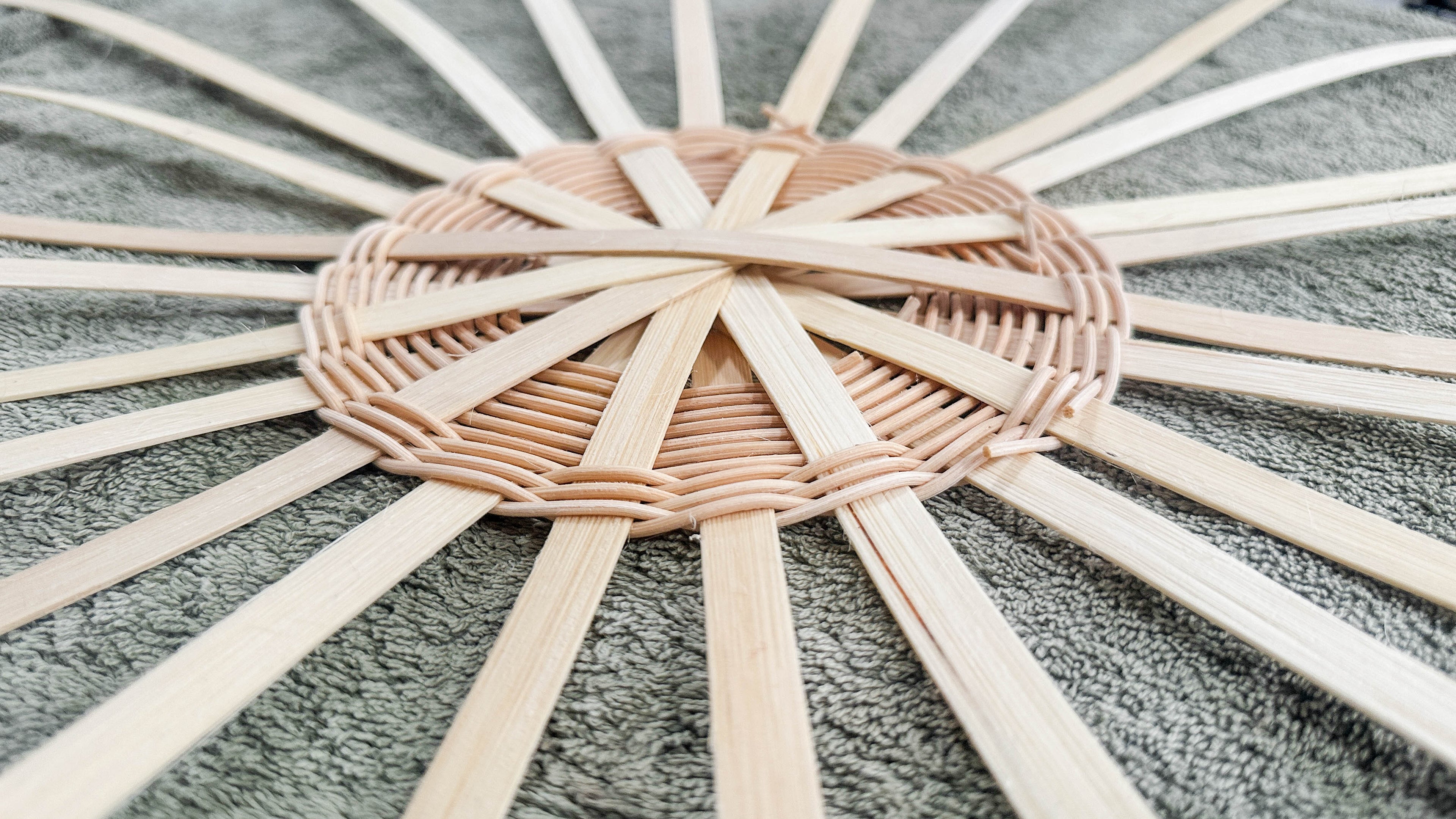 Load video: Bean pot basket in the weaving process.